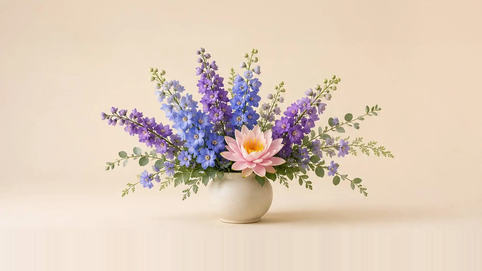 July birth flowers: tall blue larkspur and floating water lilies