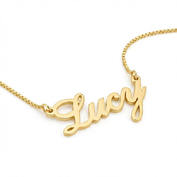 Gold plated name necklace featuring Lucy in cursive script