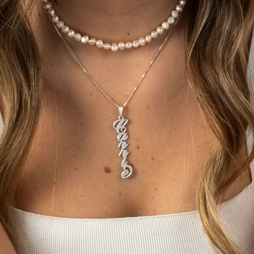 Vertical Carrie Name Necklace on a model - 2