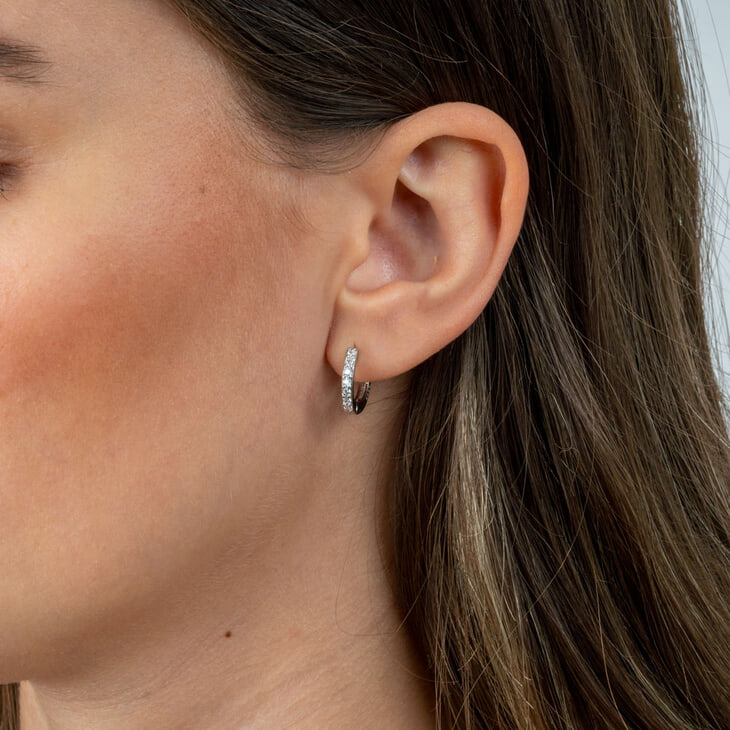 Close-up of a model with Cubic Zirconia Hoop Earrings, accentuating their refined elegance.