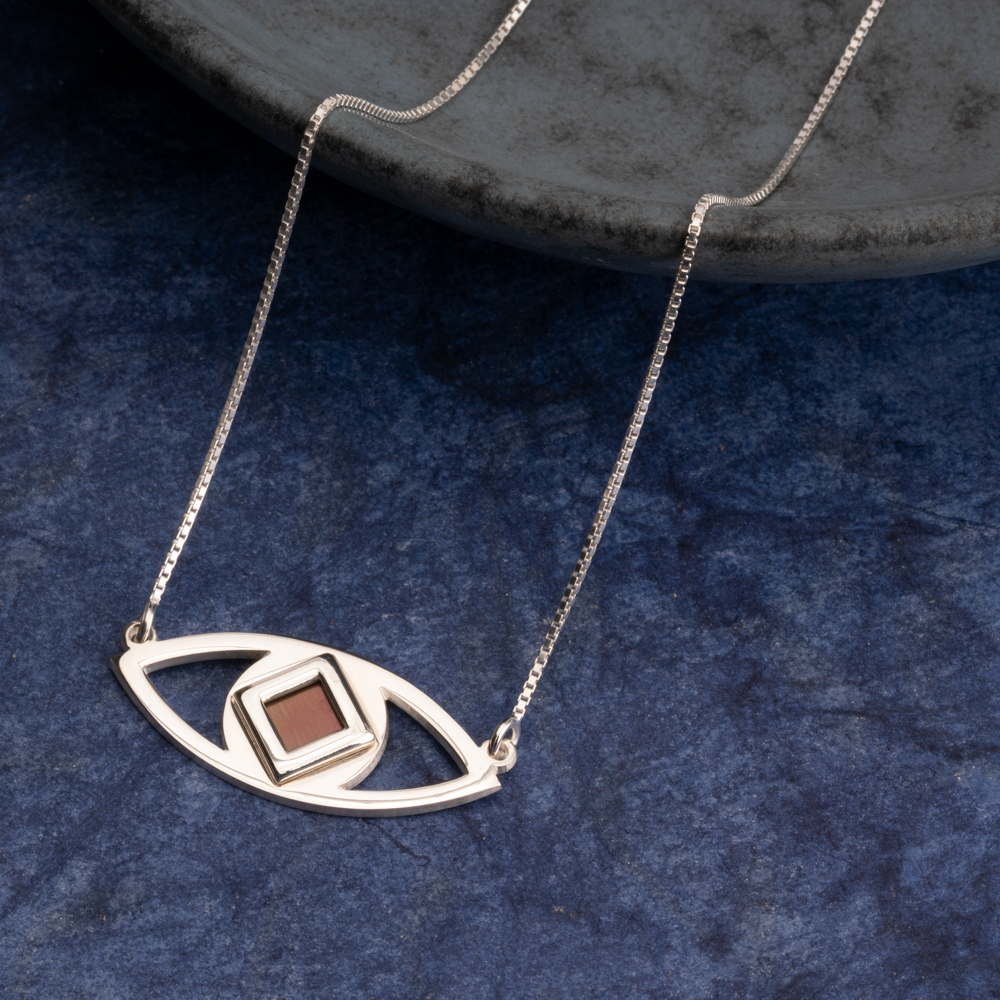 Collar de Ojo con Nano Biblia