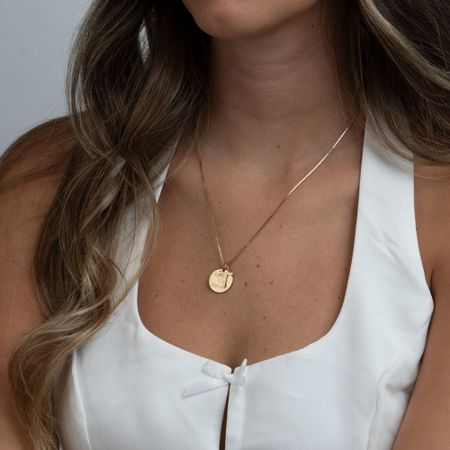 Engraved round pendant and cross