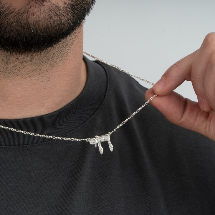 Large Chai Zirconia Pendant Necklace on a model 3