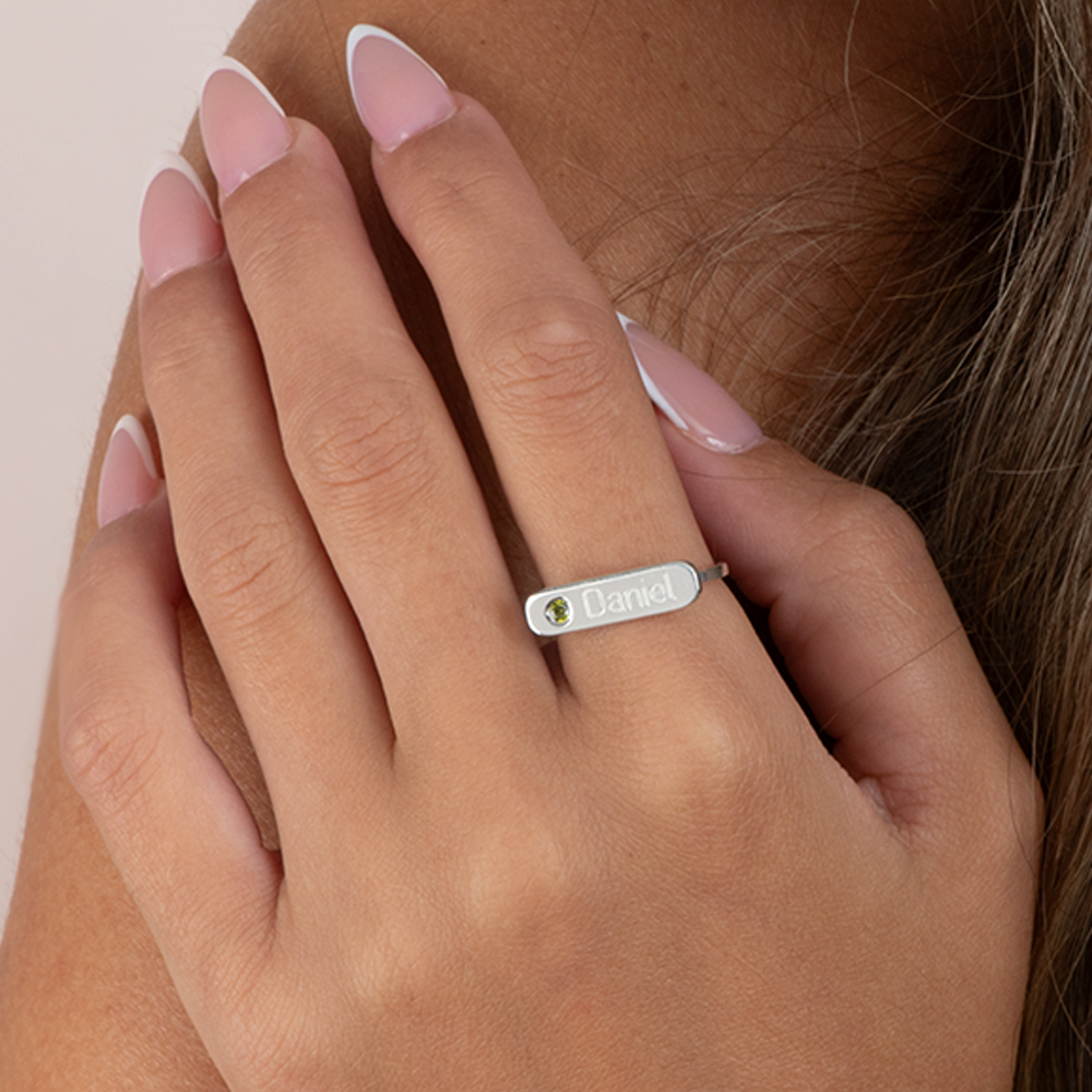 Engraved Bar Ring with Birthstone on a model