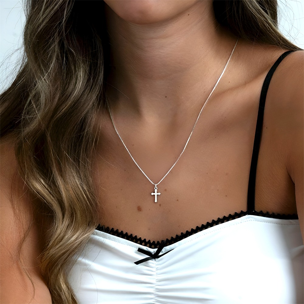 Dainty Cross Necklace in Sterling Silver 925 on a model