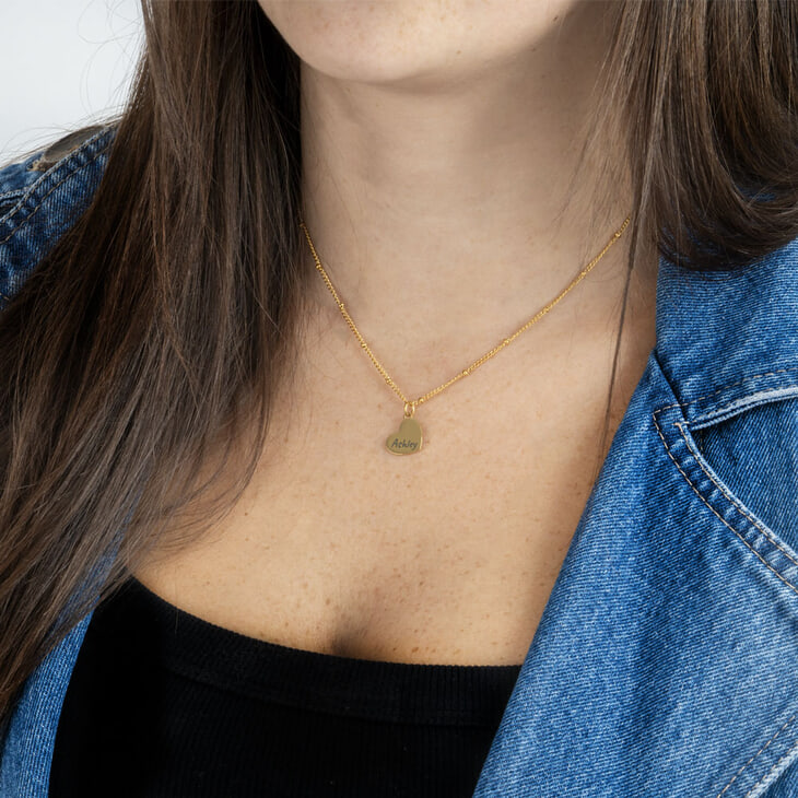 Engraved Beaded Heart Chain Necklace on a model 3