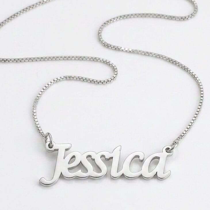 Elegant Nameplate Necklace in silver with a stylish cursive font.