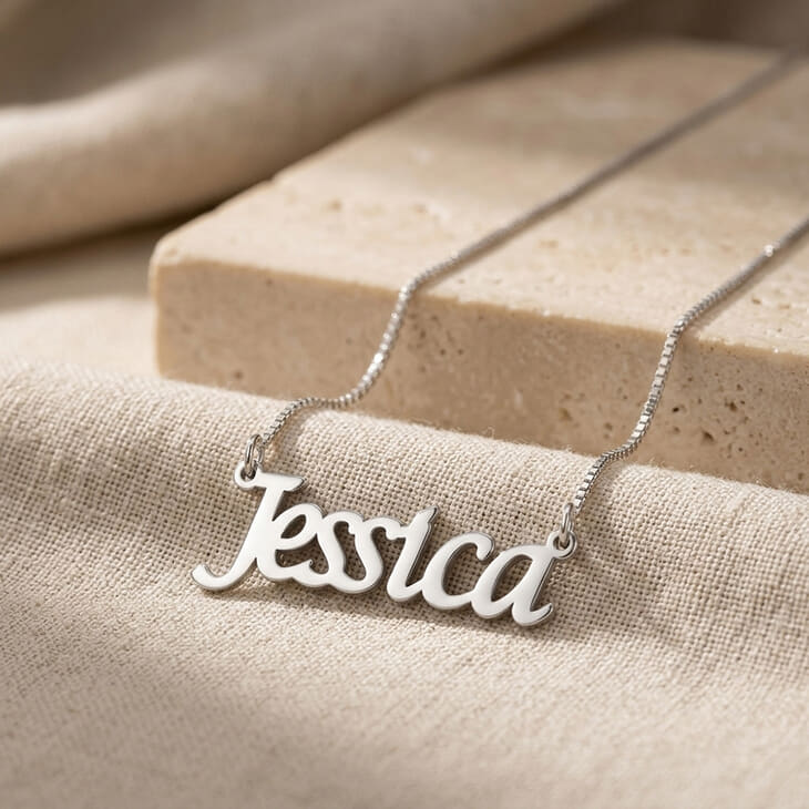 Silver nameplate necklace displaying the name Jessica in stylish script design.