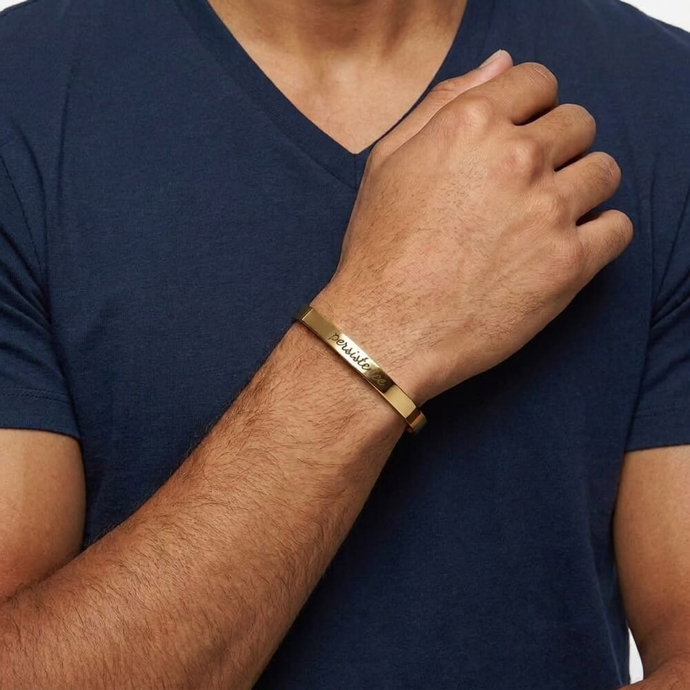 Model showcasing a personalized custom cuff bracelet on their wrist