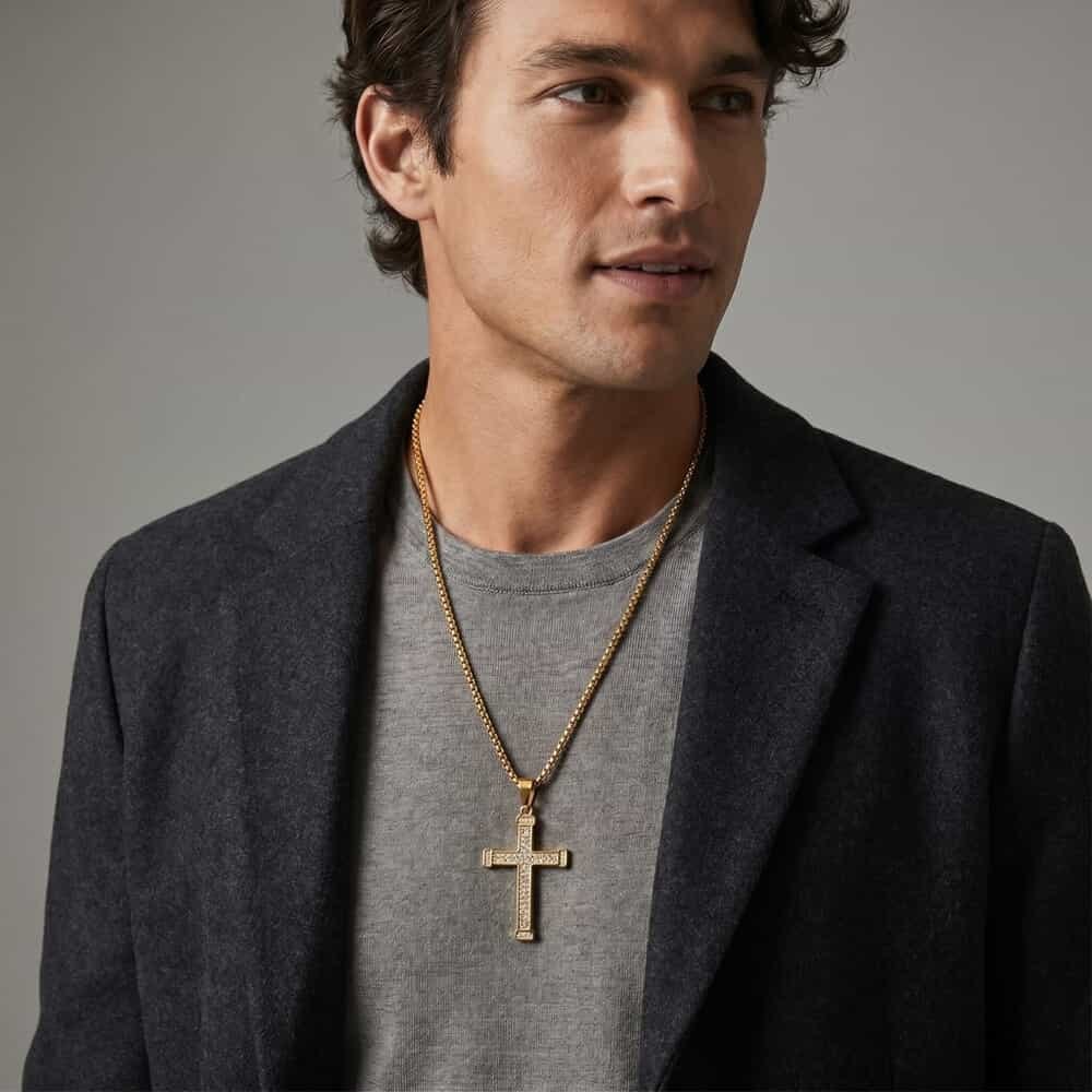 Model showcasing the Large Zircon Cross Necklace with stylish attire