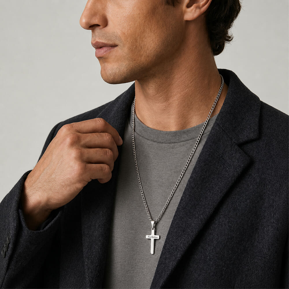 Model showcases the Custom Cross Necklace with a stylish curb chain.