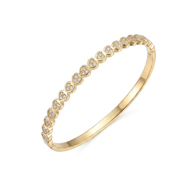 Brazalete Sparkling Heart en oro con detalles brillantes en forma de corazón a lo largo