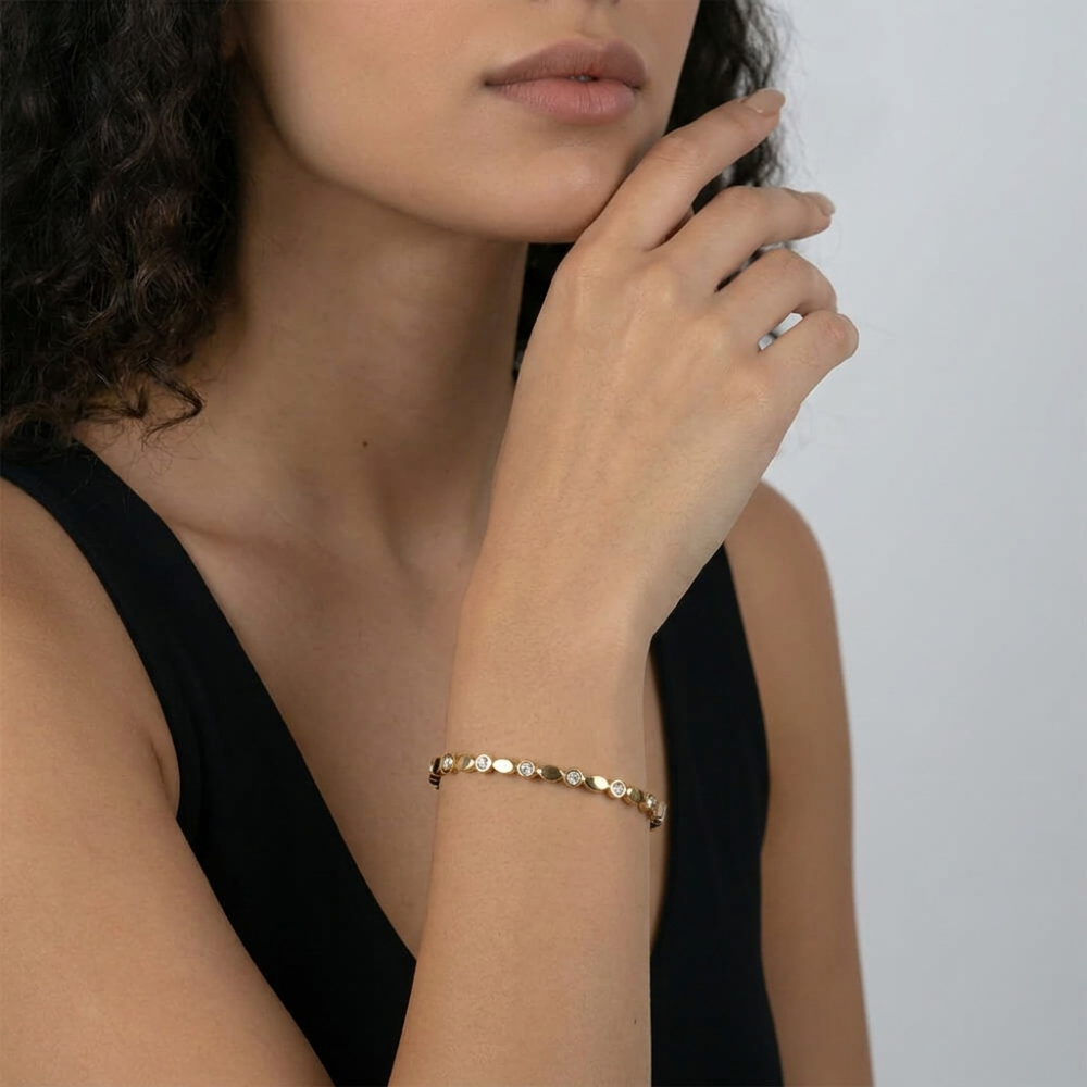 Model showcasing the Alternating CZ Bangle Bracelet with elegant styling