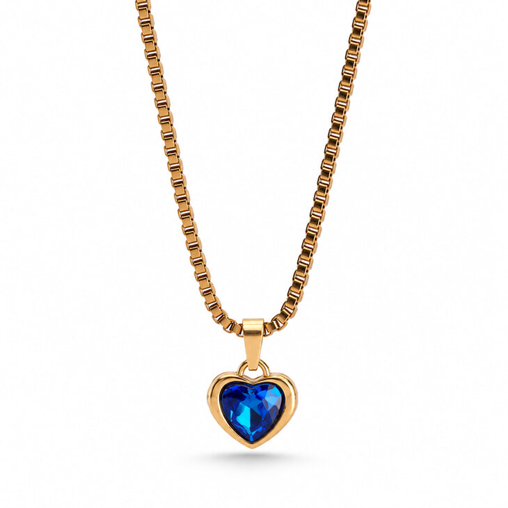 Gold heart-shaped pendant necklace showcasing a captivating blue gem